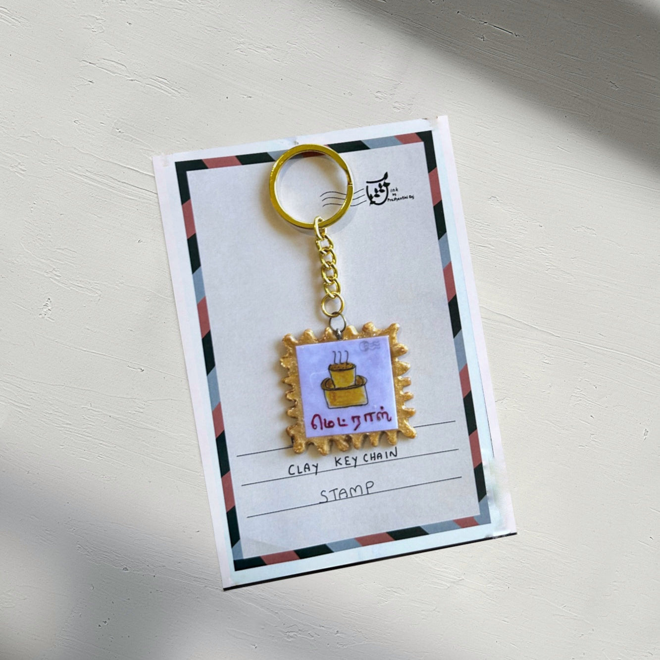 Madras Stamp Keychain-Gold